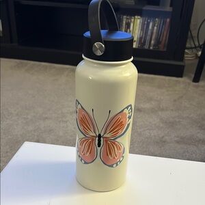 Kate Spade White Water Bottle with Butterfly Design and Black Lid